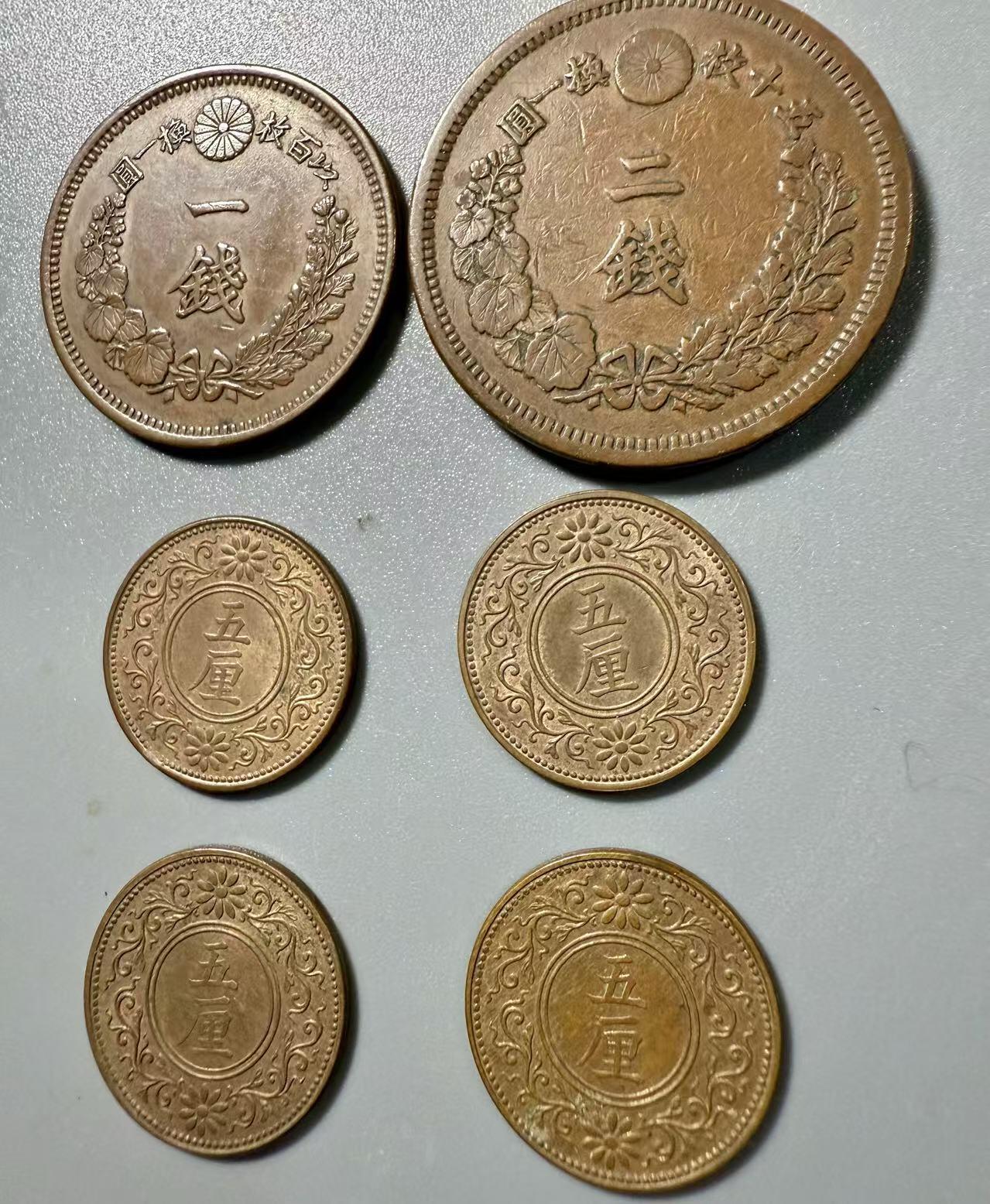 七河·世界币章小拍（总第37期）（周二结标） 美品明治八年一、二钱铜币+ 未流通品大正七年、八年五厘铜币4枚，共6枚一组，未流通品少见！