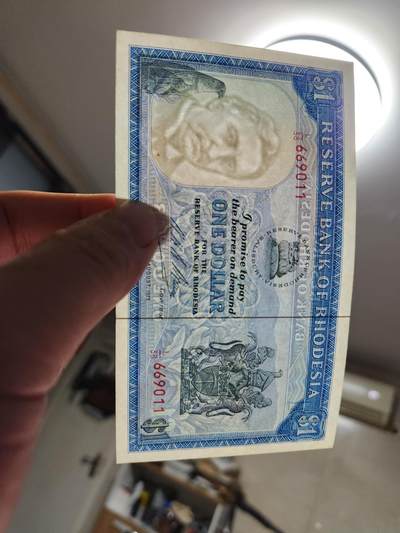 1月29号晚上8点 外国纸币自动截拍第15场 - 人像水印第一版1971年 罗德西亚1元新品