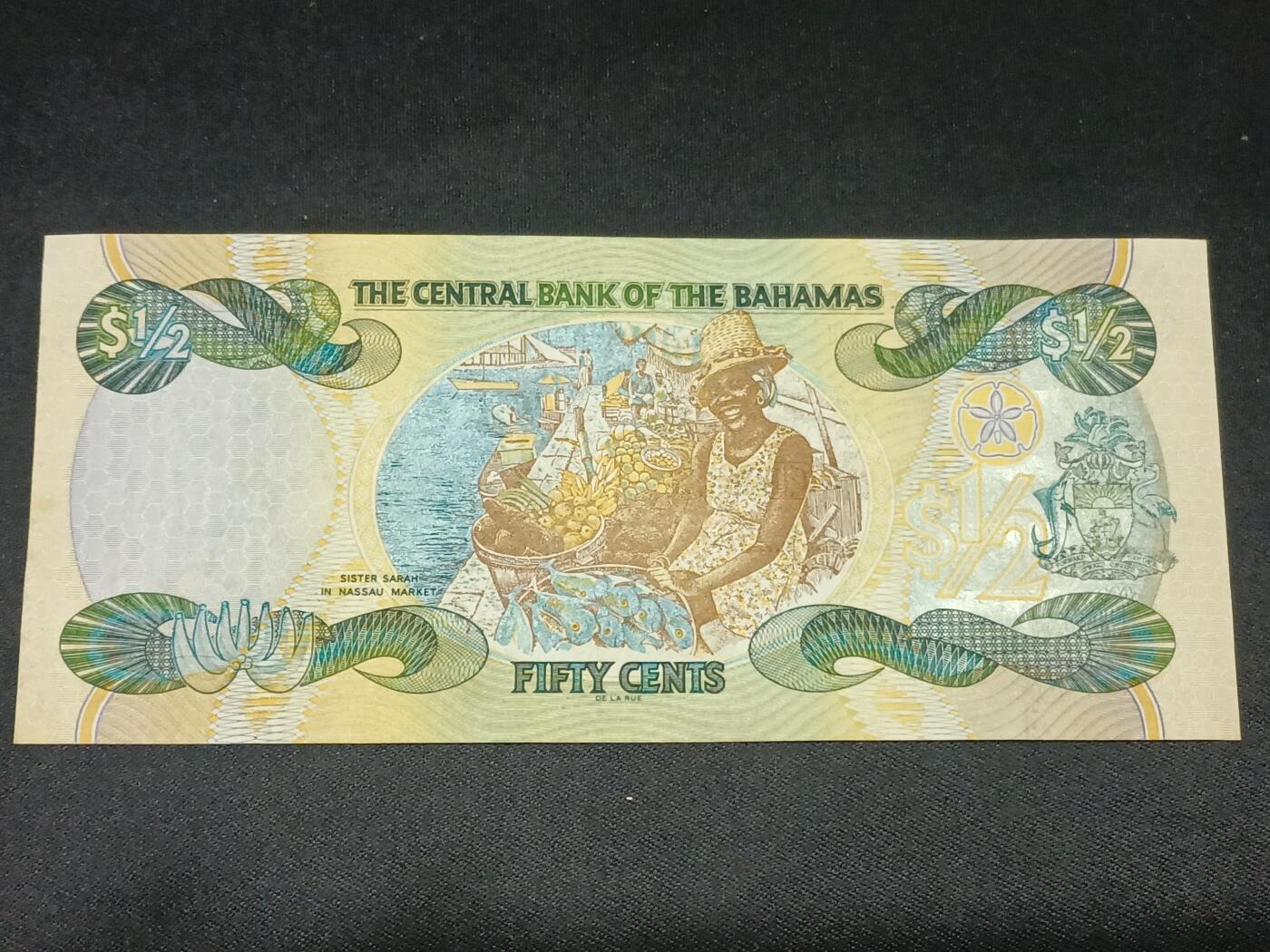 【游宝拍卖】乙巳蛇年第115期 蛇年收官场 巴哈马-1/2元【2001年 全新UNC】