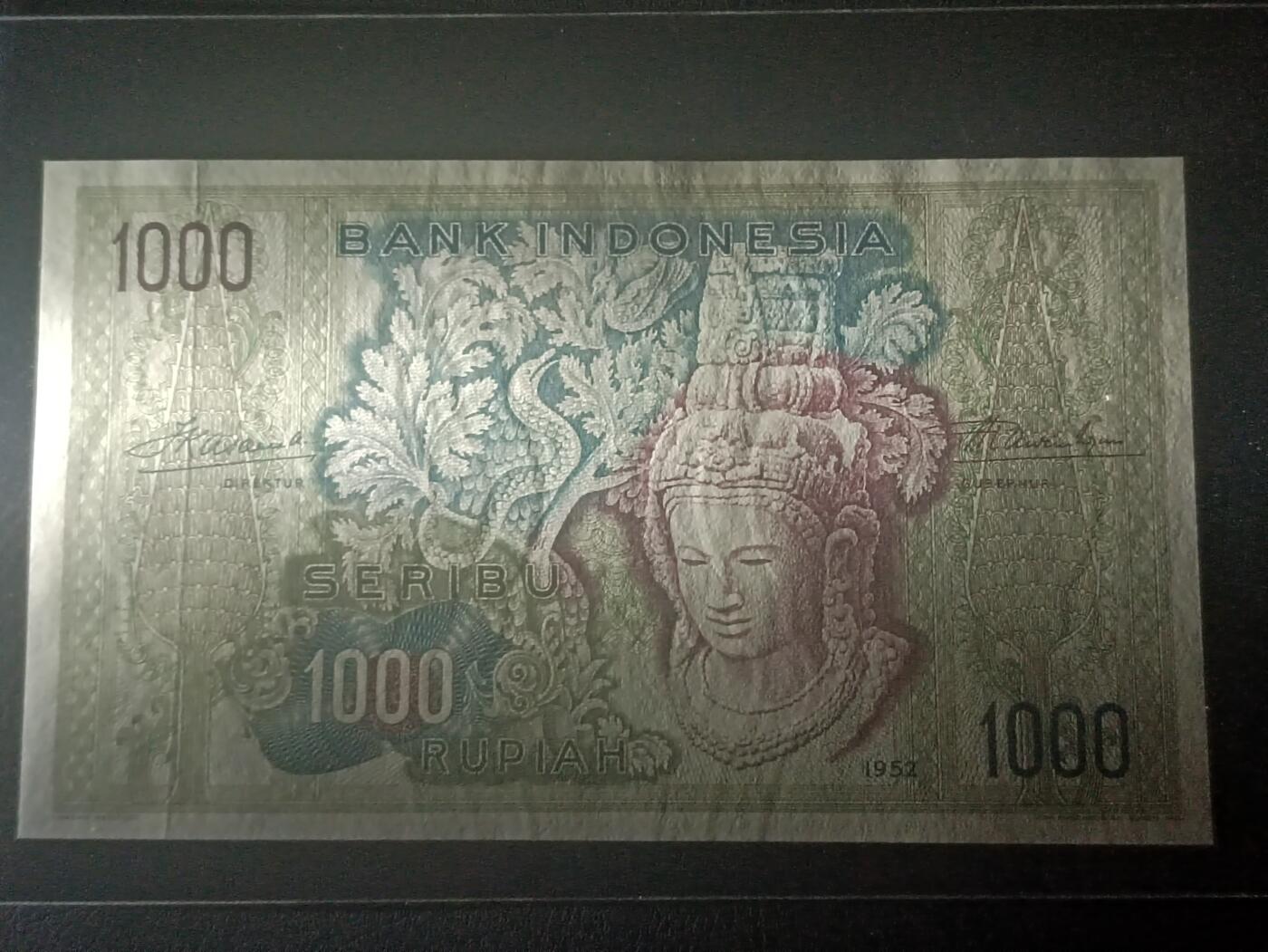 2026二月第一期，总215期 印度尼西亚1952版1000卢比AUNC有图案磨损千位号1624，此版本最大面值，经典佛头形象