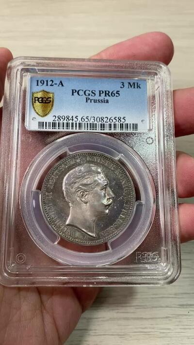 万国钱币拍卖第060期（万国六十期纪念大拍） PCGS PR65 1912普鲁士威廉二世精制长翅3马克 如同浩瀚宇宙般的绚烂星空包浆 镜面精铸高浮雕喷砂质感 无法用分数衡量的顶级视觉享受