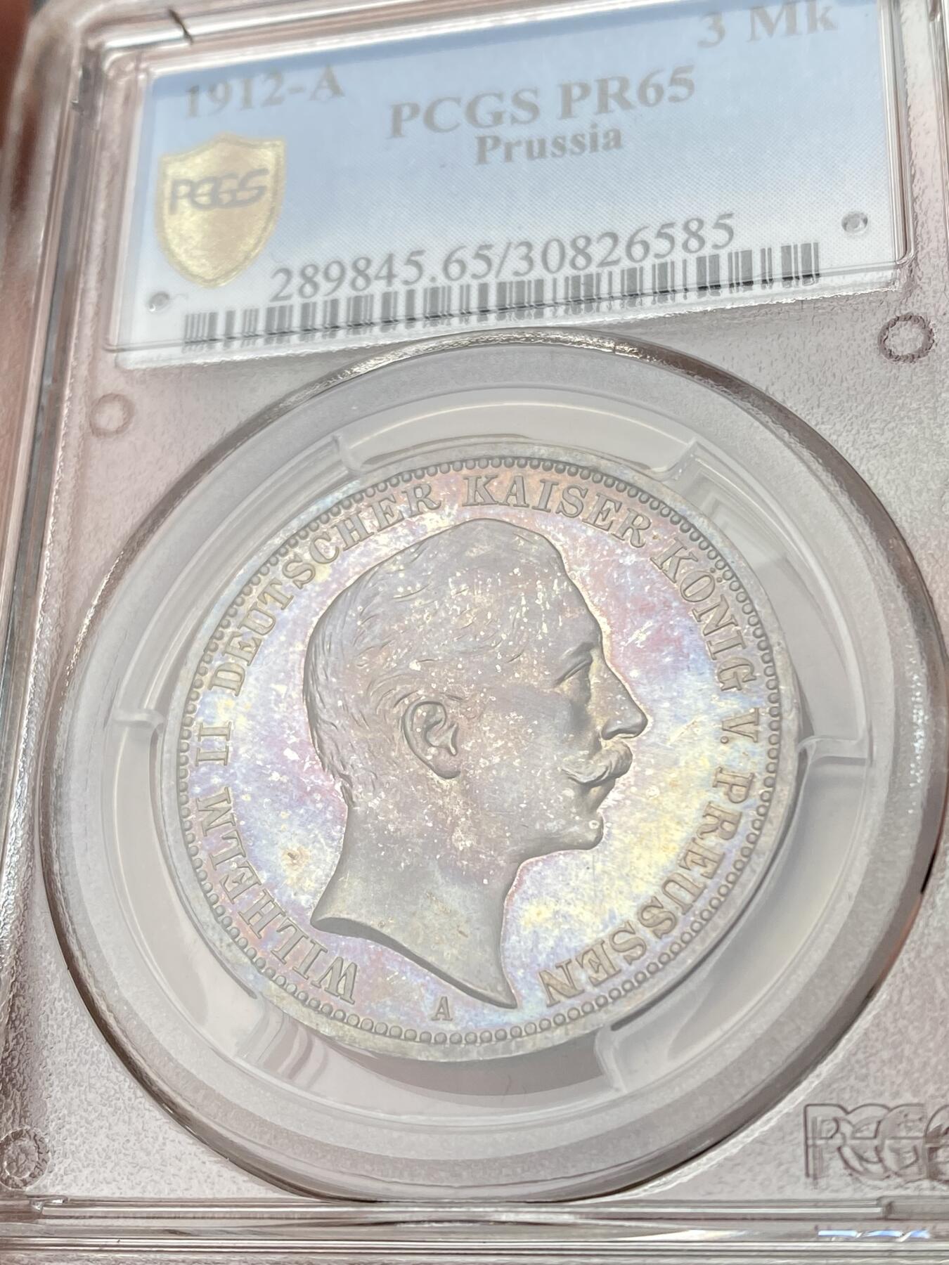 万国钱币拍卖第060期（万国六十期纪念大拍） PCGS PR65 1912普鲁士威廉二世精制长翅3马克 如同浩瀚宇宙般的绚烂星空包浆 镜面精铸高浮雕喷砂质感 无法用分数衡量的顶级视觉享受