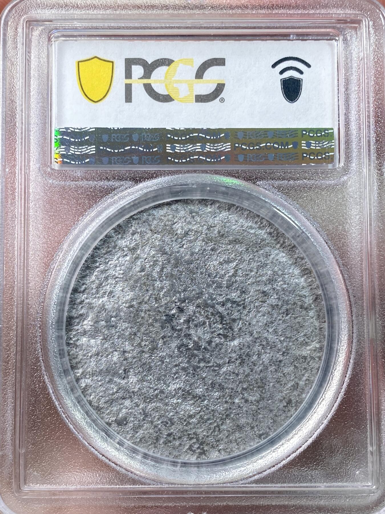 万国钱币拍卖第060期（万国六十期纪念大拍）  PCGS MS63 1811年英格兰银行系列乔治三世1元样币-正面铸样 经过改动后此头像被用于5先令又6便士的样币上。理查德·马乔里旧藏，法国与英国SOHO MINT铸币的专家，1958年成为币商，后期设计铸造了大名鼎鼎的古巴流亡政府少女比索银币，最后被美国政府查抄模具而收场。他上世纪60年代以来购买的出自包括法鲁克国王、苏尔曼等顶级集藏的英法藏品近两年来屡屡排出高价。附带原标签和纸袋。