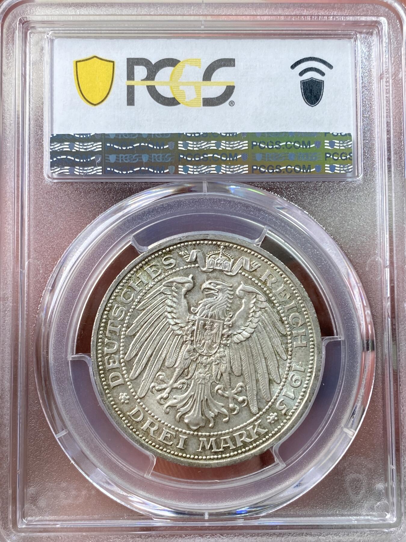 万国钱币拍卖第060期（万国六十期纪念大拍） PCGS MS67 1915普鲁士曼斯菲尔德屠龙3马克银币 普鲁士名誉品种 柏林厂铸造 发行量仅3万枚  丝绸底板邮票光泽德式淡彩环绕 顶级GEM+典藏品质