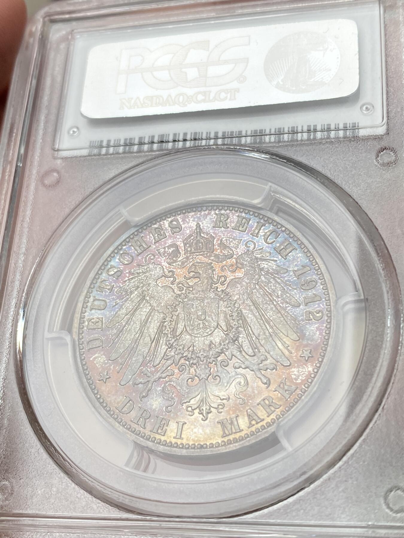 万国钱币拍卖第060期（万国六十期纪念大拍） PCGS PR65 1912普鲁士威廉二世精制长翅3马克 如同浩瀚宇宙般的绚烂星空包浆 镜面精铸高浮雕喷砂质感 无法用分数衡量的顶级视觉享受