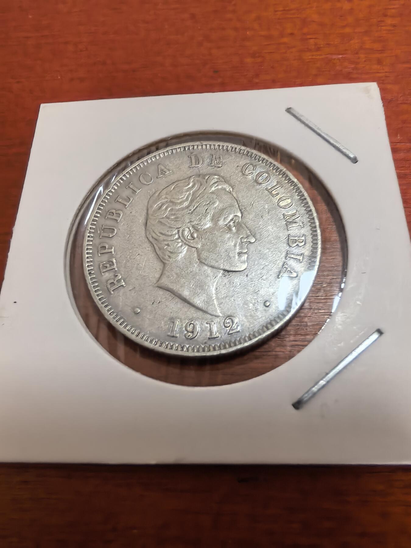 长老汇蛇年精选第九十七场拍卖 1912哥伦比亚玻利瓦尔50分银币，12.5克900银，首年份，克书XF40分40美金