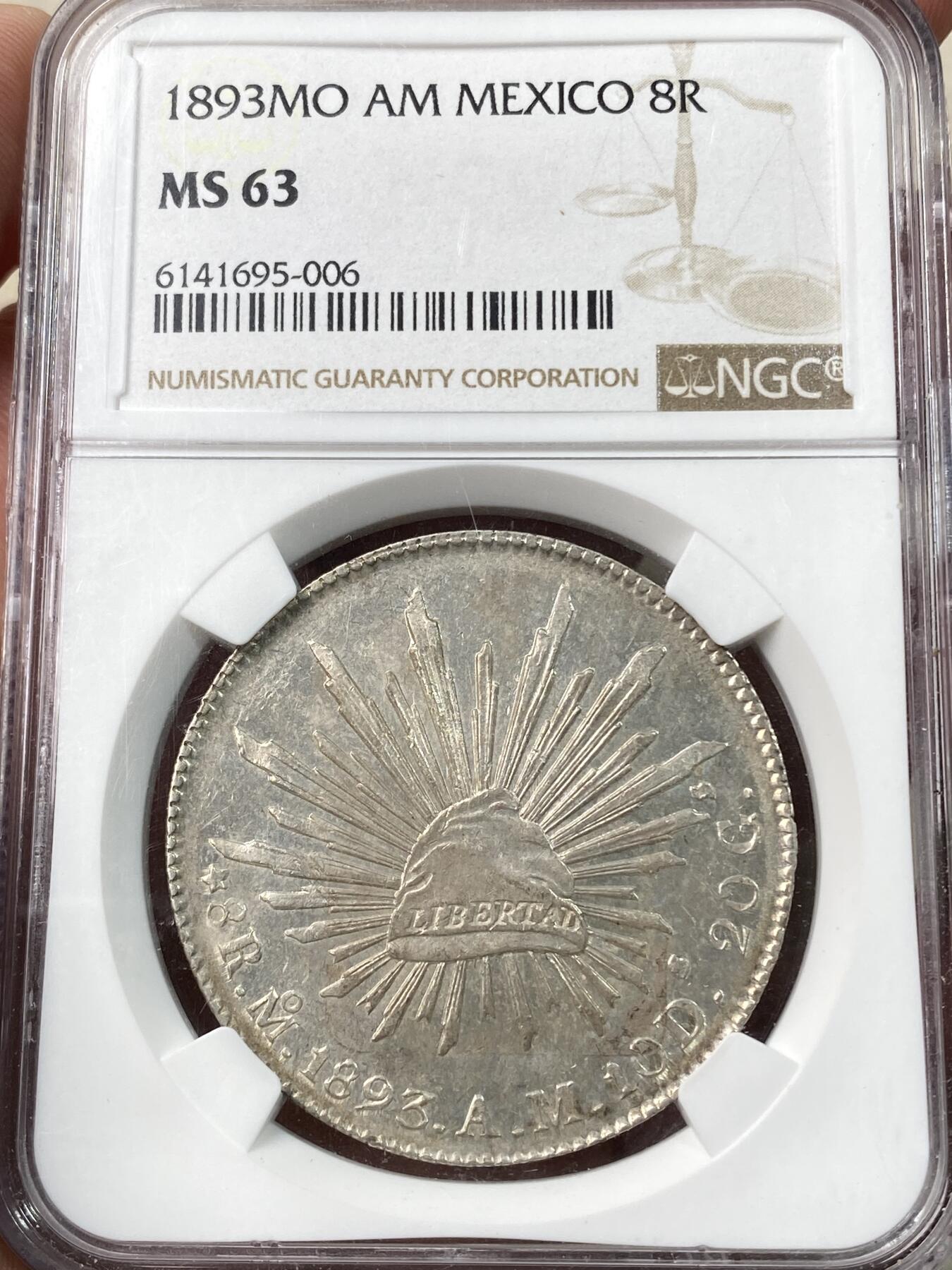 万国钱币拍卖第060期（万国六十期纪念大拍） NGC MS63 1893MO AM墨西哥花边鹰洋8R 原味香槟金淡彩银霜质感 打制深峻细节极佳