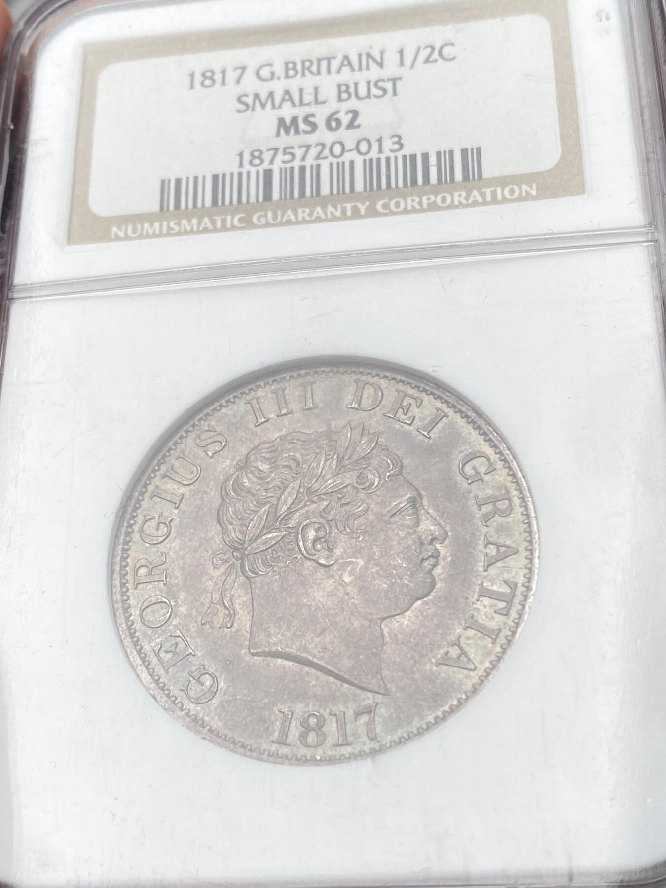 万国钱币拍卖第060期（万国六十期纪念大拍） NGC MS62 1817英国乔治三世半克朗银币 小头版乔三 原味英式乌云五彩极美 NGC老白盒收藏级品质