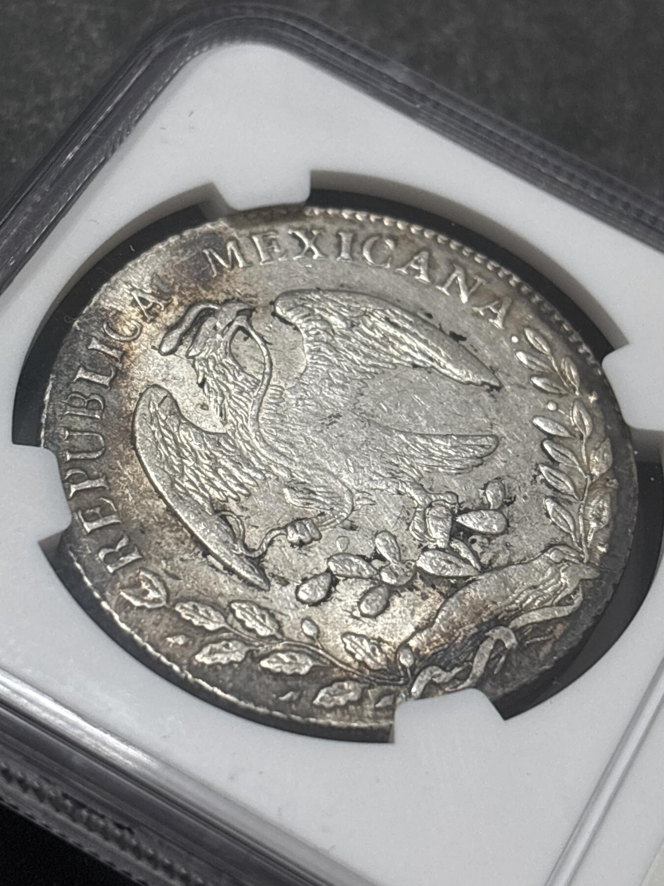 文馨钱币收藏 2026新年第五场（第 291 场）【长期接代拍品】 NGC 评级 AU D，少见 1876 年墨西哥早期花边鹰洋银元，黄油环彩状态，细节清洗，可圈可点