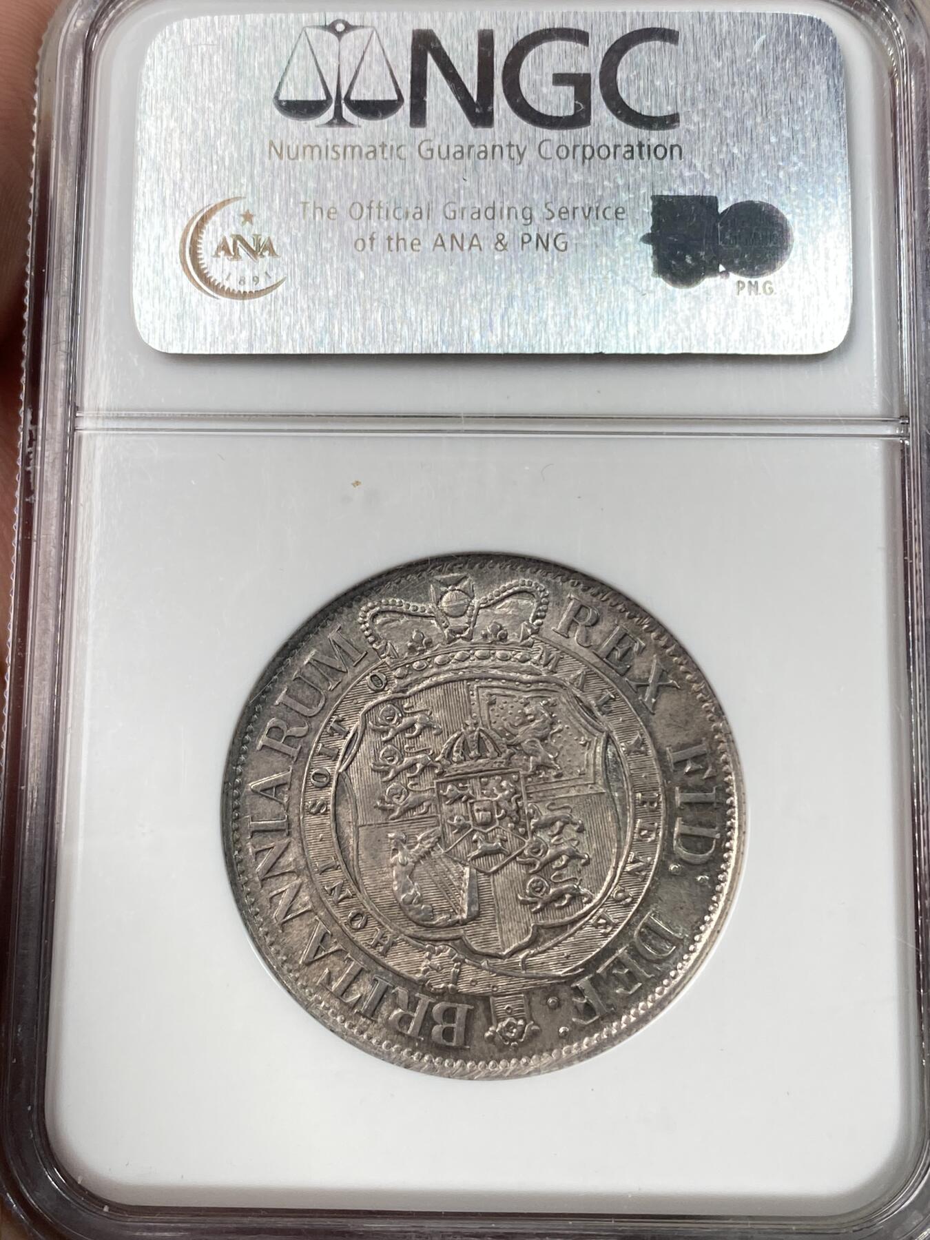 万国钱币拍卖第060期（万国六十期纪念大拍） NGC MS62 1817英国乔治三世半克朗银币 小头版乔三 原味英式乌云五彩极美 NGC老白盒收藏级品质