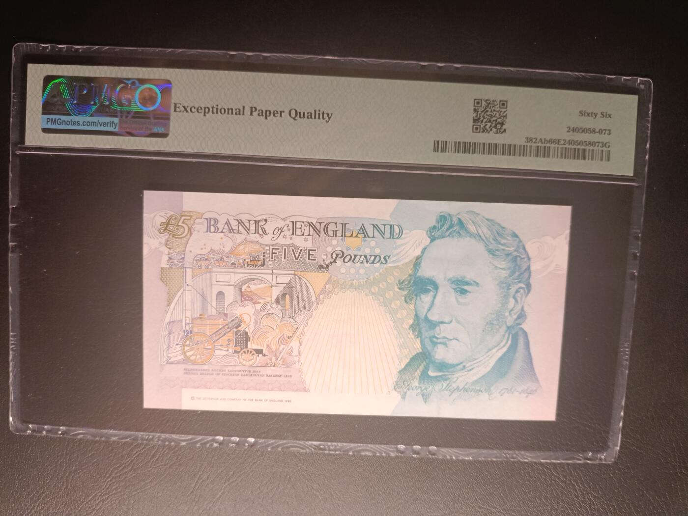 2026二月第一期，总215期 英格兰E序列皇冠初版5镑PMG66epq，中年女王和史蒂芬逊