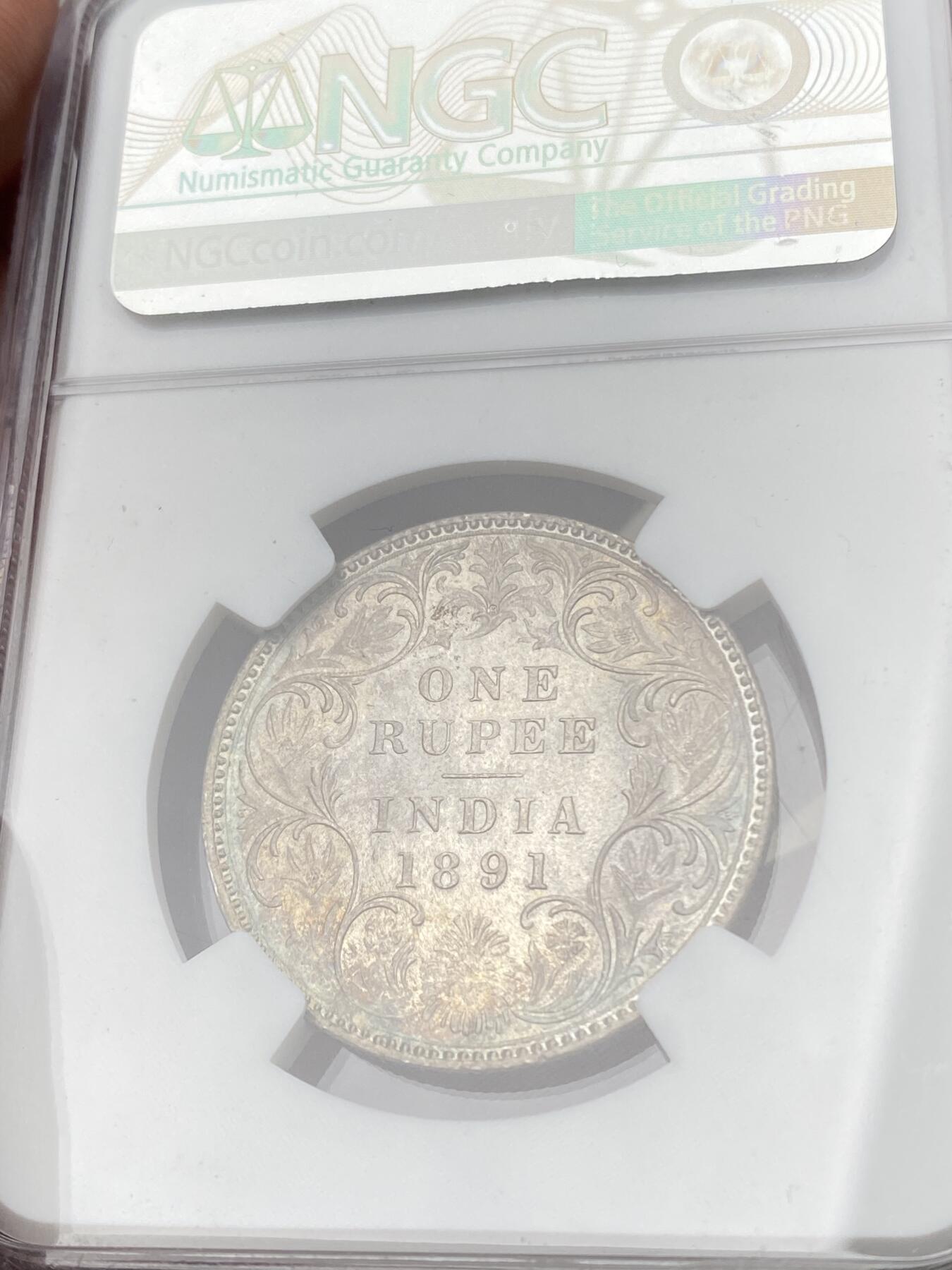 万国钱币拍卖第060期（万国六十期纪念大拍） NGC MS64 1891B英属印度维多利亚女王卢比银币 孟买厂铸造 全深打粉光五彩极美 观感远超分数的收藏级品质