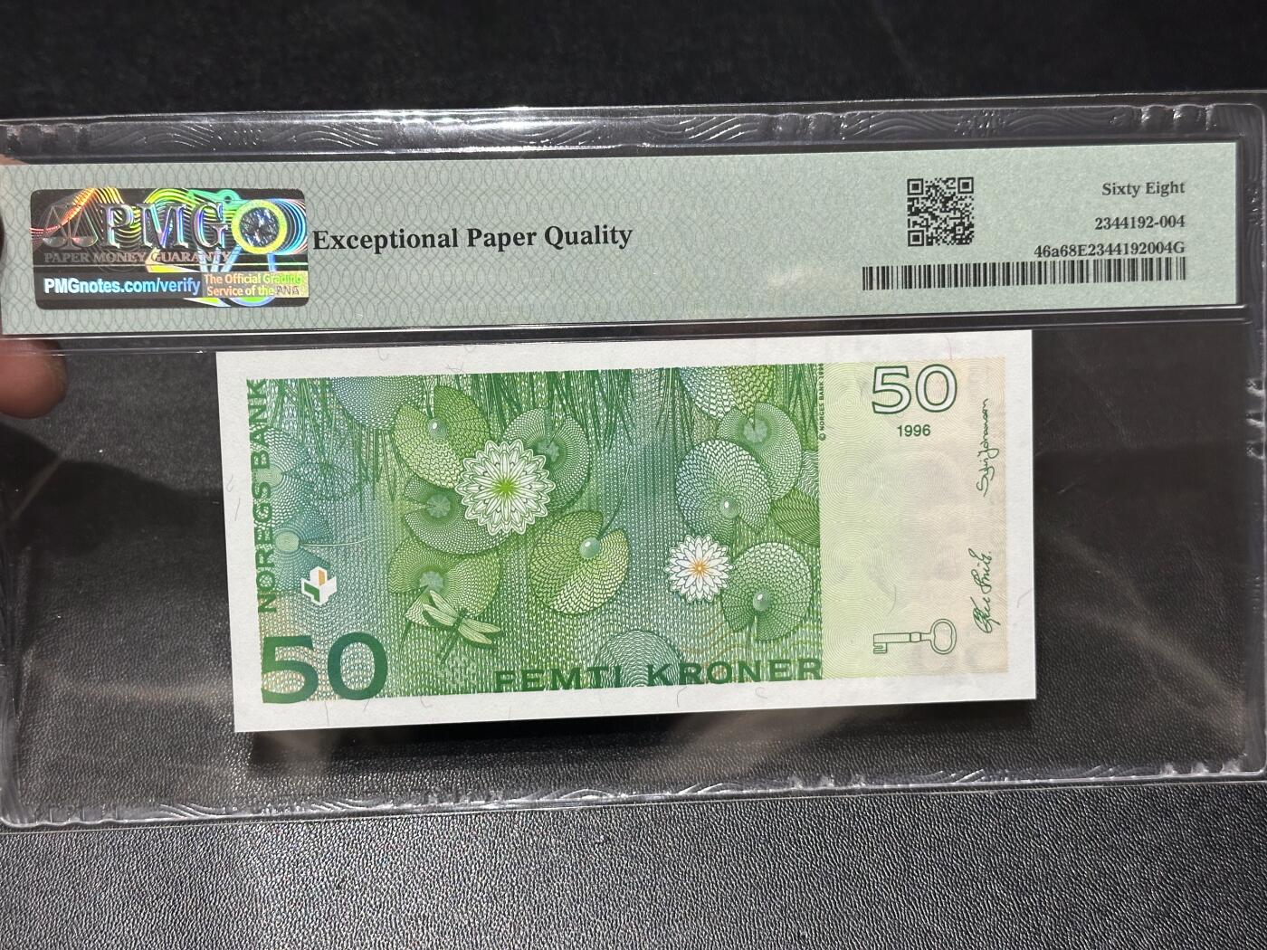 《外钞收藏家》第六百零六期（精品场）（本平台长期征集拍品、欢迎藏友们联系合作） 1996年挪威50克朗 初版 PMG68 高分 无47尾88