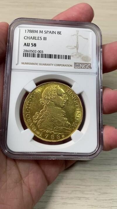 万国钱币拍卖第060期（万国六十期纪念大拍） NGC AU58 1788M M西班牙卡洛斯三世8埃斯库多大金 马德里厂铸造 好品难得的本土8E 全深打无减重痕黄金转光 1788也是西班牙明君卡洛斯三世在位的最后一个年份 极其难得的收藏级品质 国际市场大热门品质 国际市场大热品种 西属大金价格全线上涨  此次贴脸入手机会切勿错过