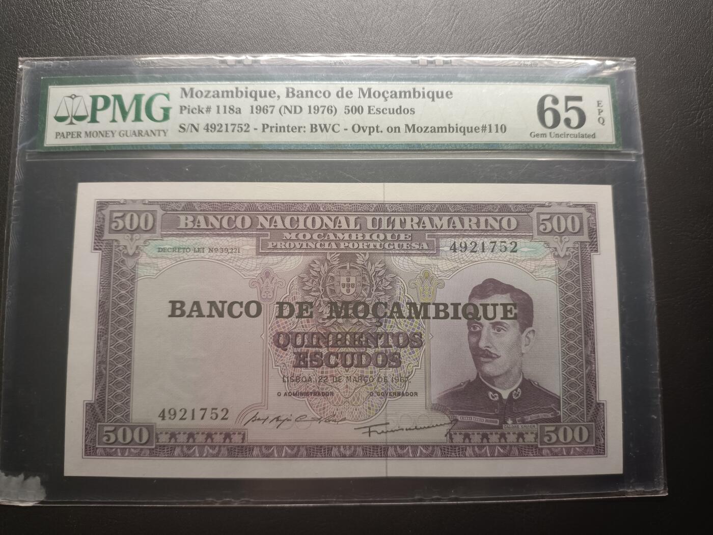 2026二月第一期，总215期 莫桑比克1976版500艾斯库多PMG65epq，用旧葡属纸币临时加盖，早期壳