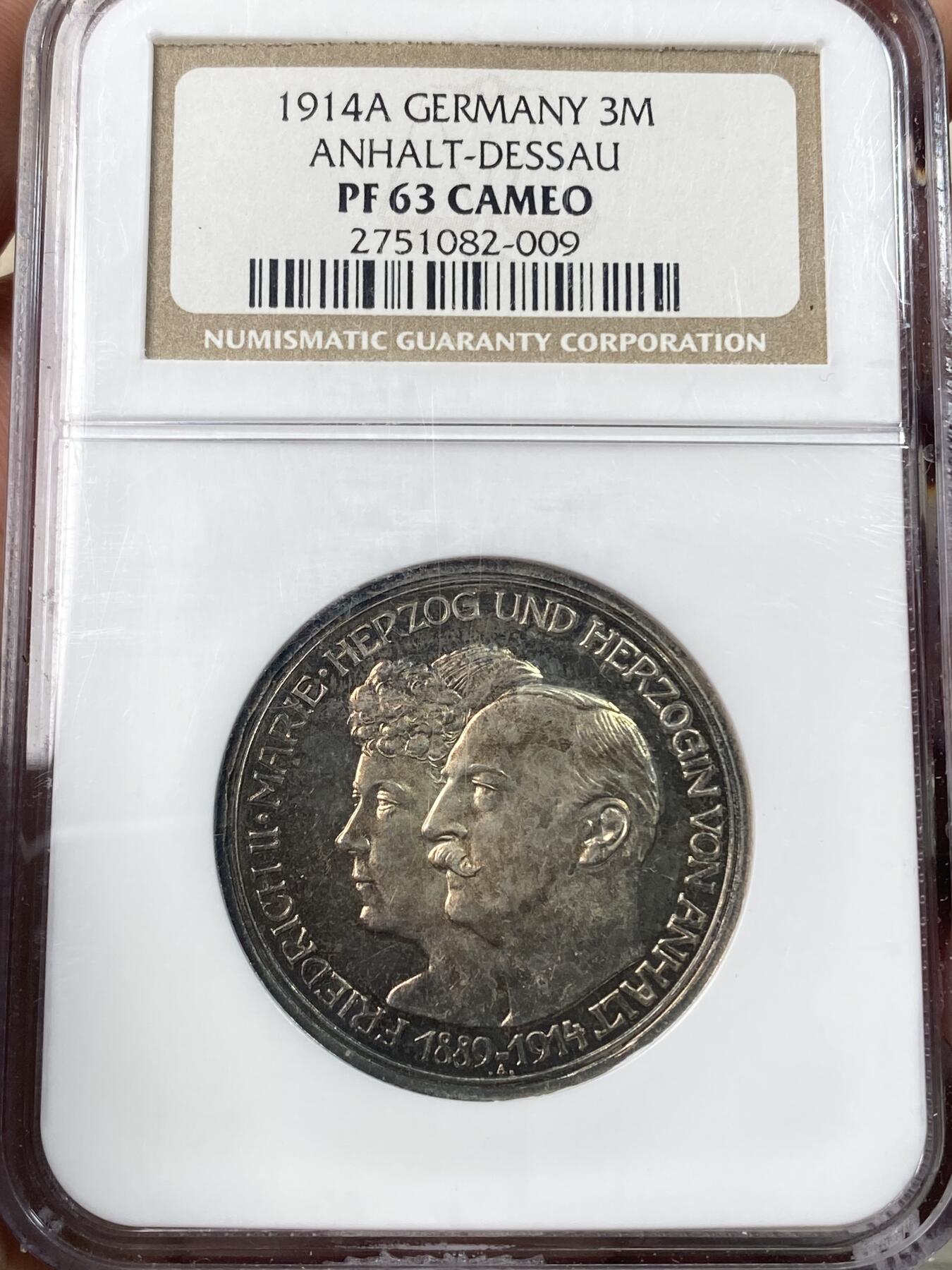 万国钱币拍卖第060期（万国六十期纪念大拍） NGC PF63CAM 1914德国安哈特德绍结婚纪念精制长翅3马克银币 经典小邦品种 镜面精铸五彩极美 NGC老白盒收藏级品质