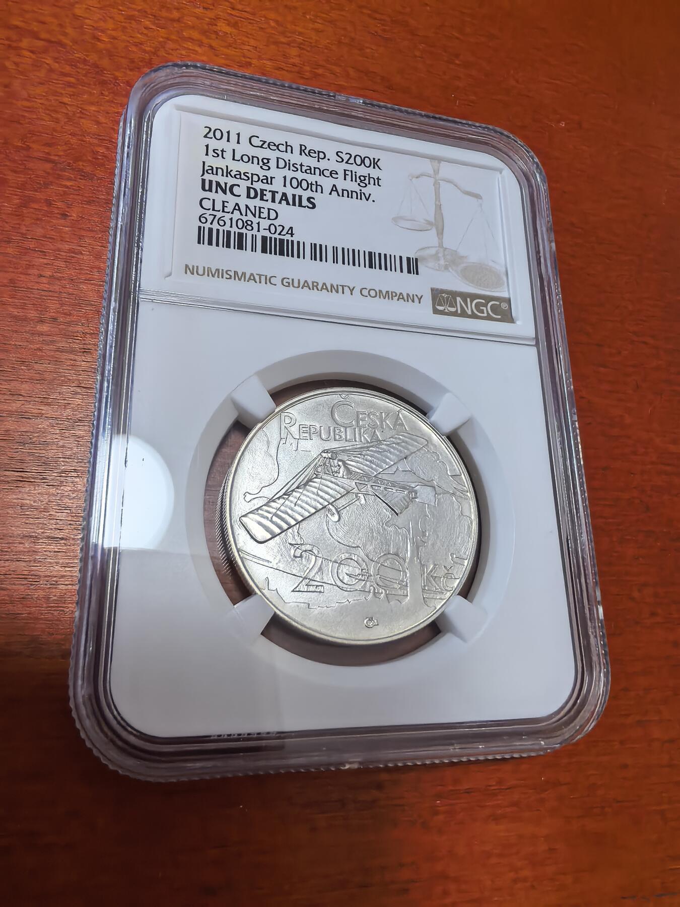 长老汇蛇年精选第九十七场拍卖 2011捷克首次长距离飞行百周年200克朗银币，NGC UNC
