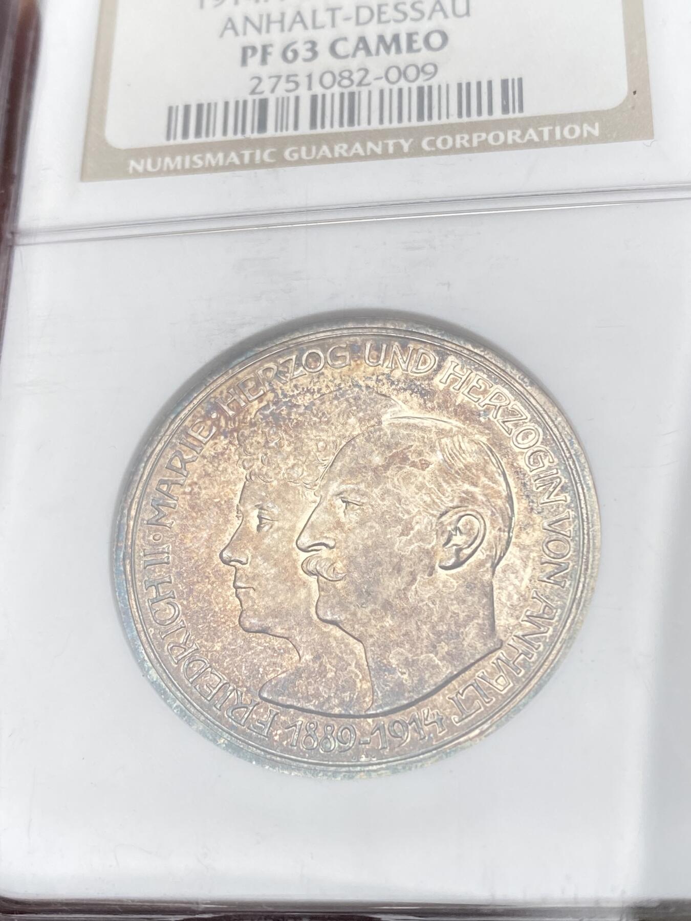 万国钱币拍卖第060期（万国六十期纪念大拍） NGC PF63CAM 1914德国安哈特德绍结婚纪念精制长翅3马克银币 经典小邦品种 镜面精铸五彩极美 NGC老白盒收藏级品质