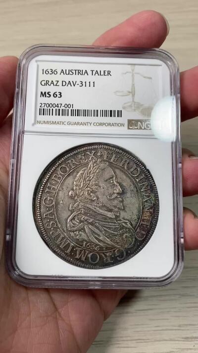 万国钱币拍卖第060期（万国六十期纪念大拍） NGC MS63 神圣罗马帝国1636年费迪南德二世大泰勒  格拉茨厂铸。正面为头戴桂冠，身着戎装的皇帝肖像，背面是格拉茨厂的特色华美盾徽。五彩原味厚包浆，打制深峻且周正，63中的佼佼者。类似63分在25年欧拍成交价约合3万人民币。