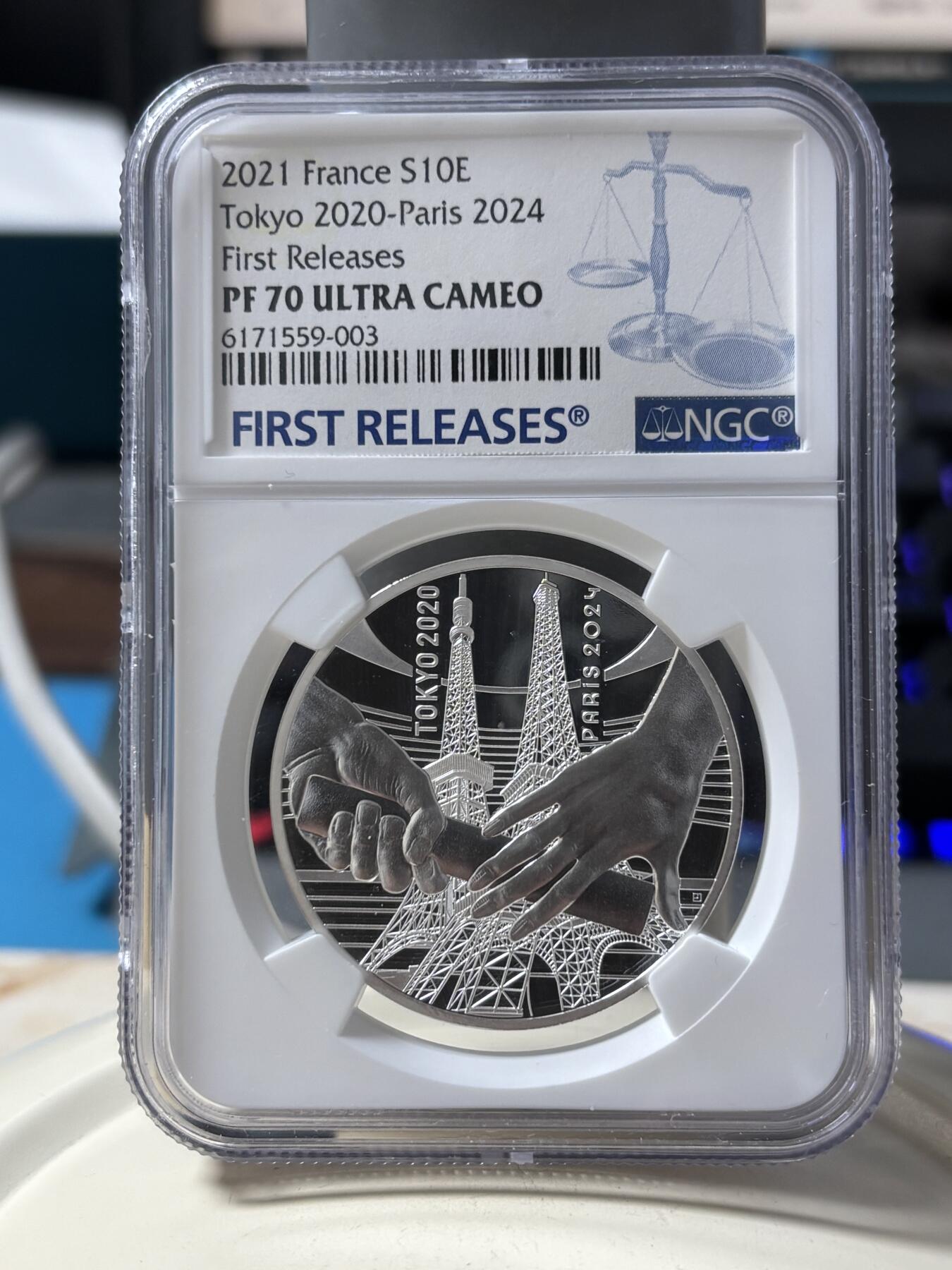 第190期拍卖 法国2021年东京到巴黎奥运交接纪念银币NGC-PF70首，22.2克，999银，发行30000枚，有白点