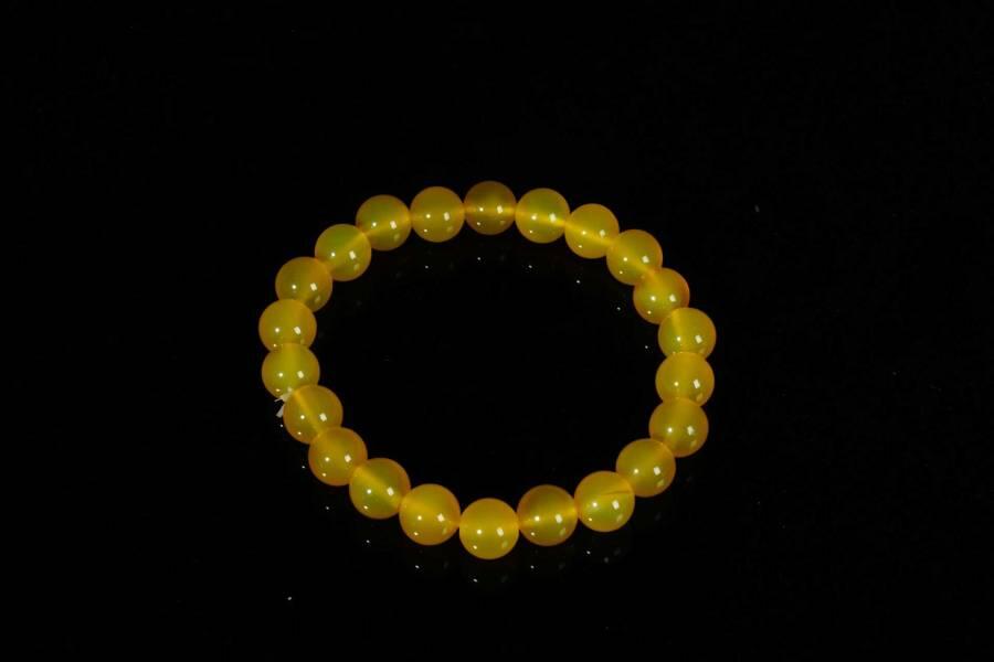 上海都达杂项专场十八（全场包邮） 天然黄玛瑙0.8圆珠手串 附鉴定证书