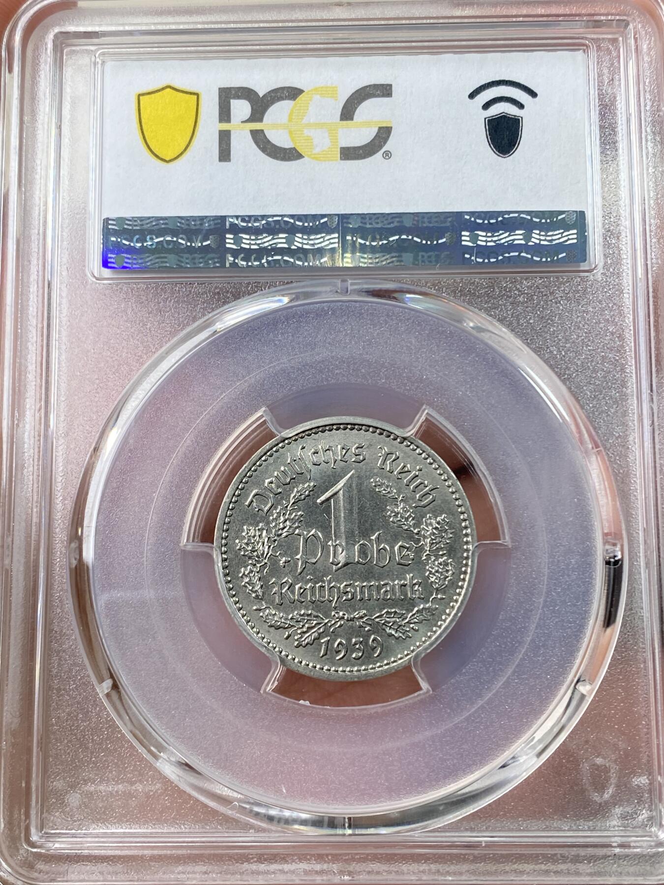 万国钱币拍卖第060期（万国六十期纪念大拍） PCGS SP64 1939/40德国社会主义工人党时期1马克样币（非银质） 极其罕见的三帝国样币品种 原光保存完好 收藏级品质（原图请私信后台或自行查询官网）