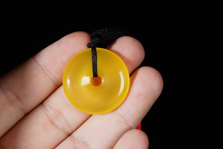 上海都达杂项专场十八（全场包邮） 天然黄玛瑙圆满平安扣挂件 附鉴定证书