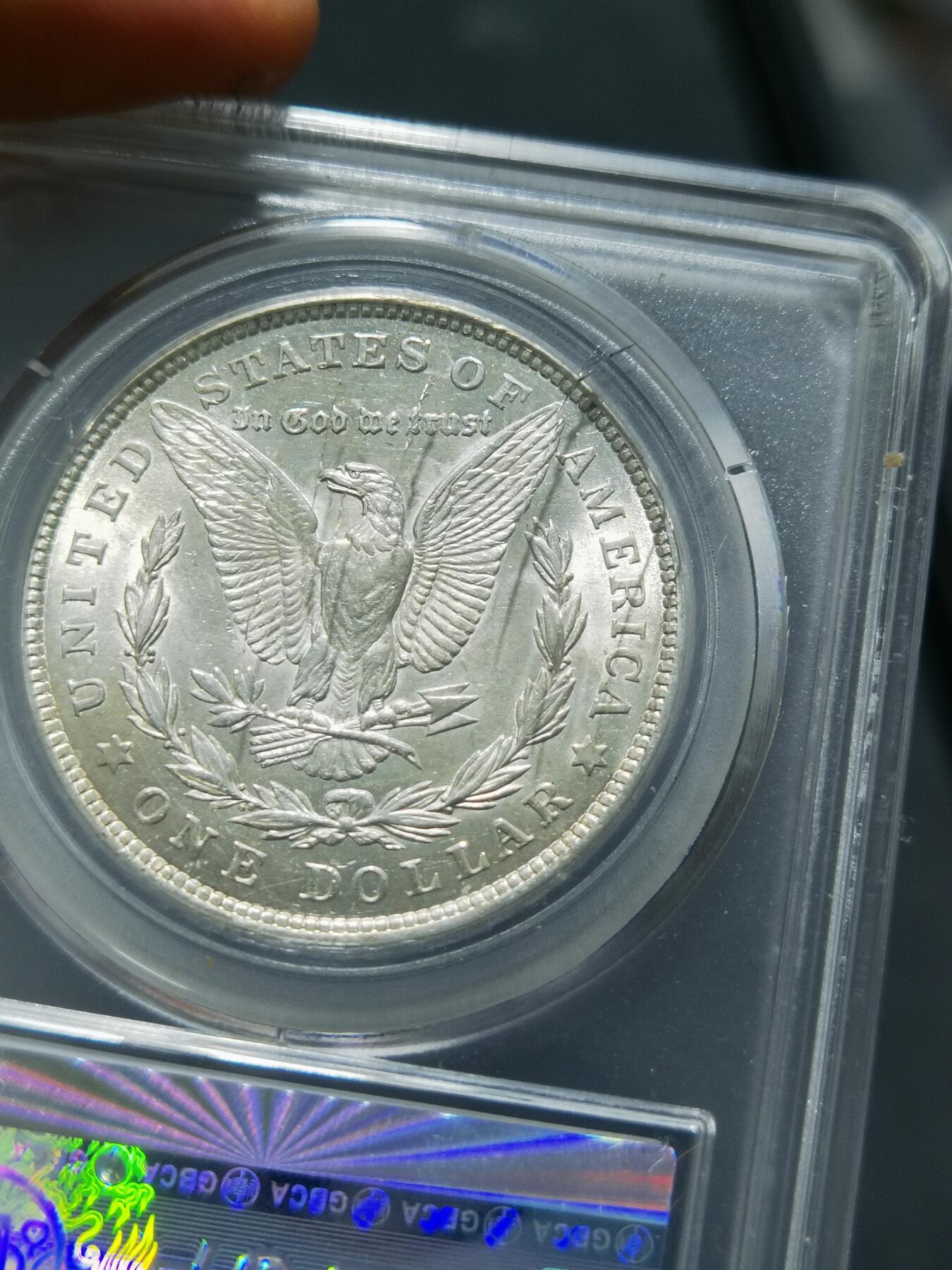 天下钱庄专场欢迎参拍 公博评级MS64美国摩根一美元银币，盒子有点裂