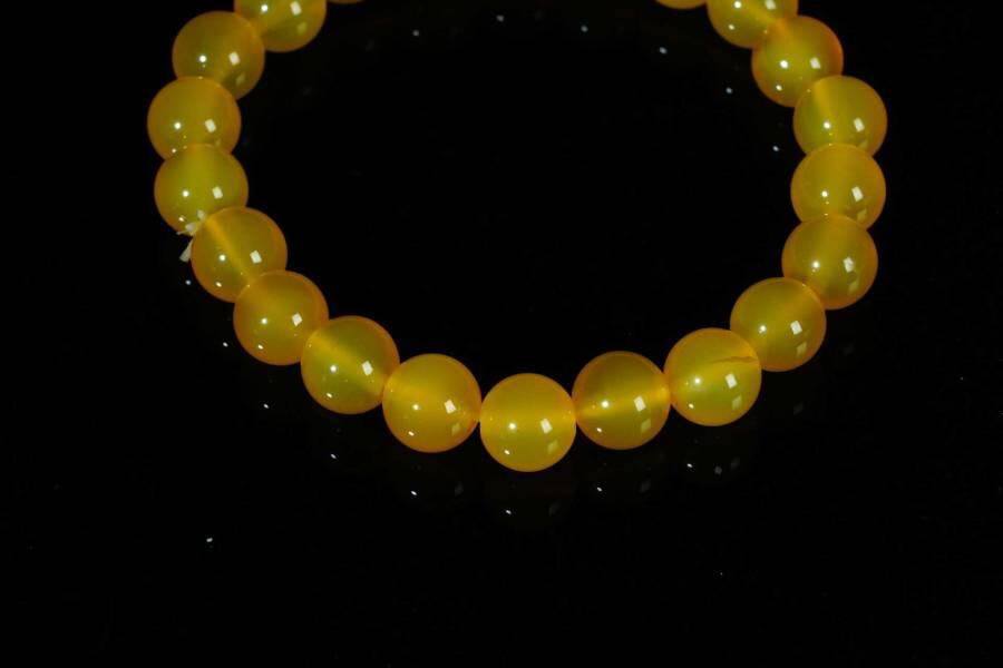 上海都达杂项专场十八（全场包邮） 天然黄玛瑙0.8圆珠手串 附鉴定证书