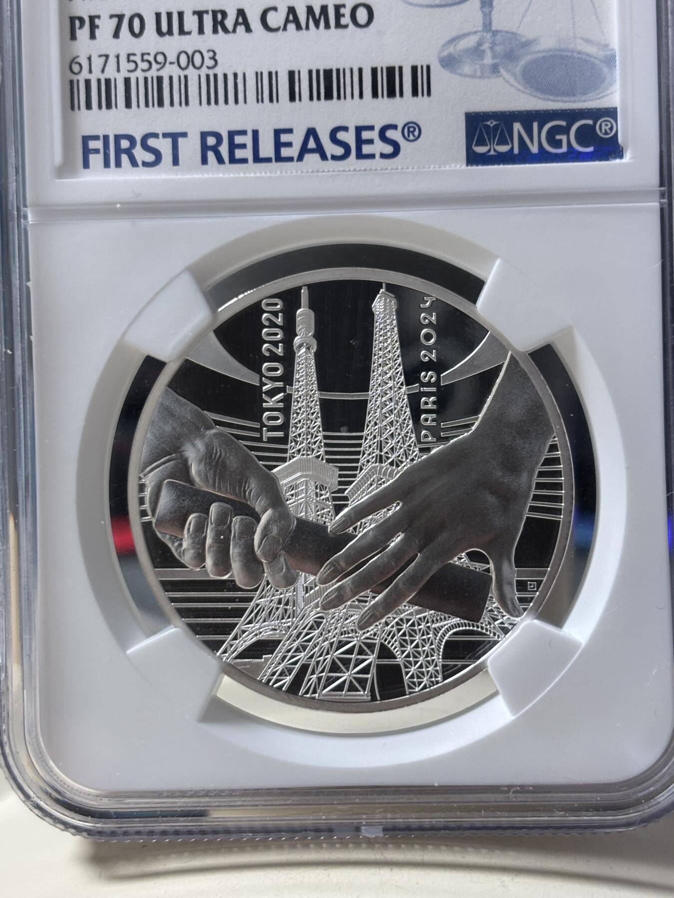 第190期拍卖 法国2021年东京到巴黎奥运交接纪念银币NGC-PF70首，22.2克，999银，发行30000枚，有白点