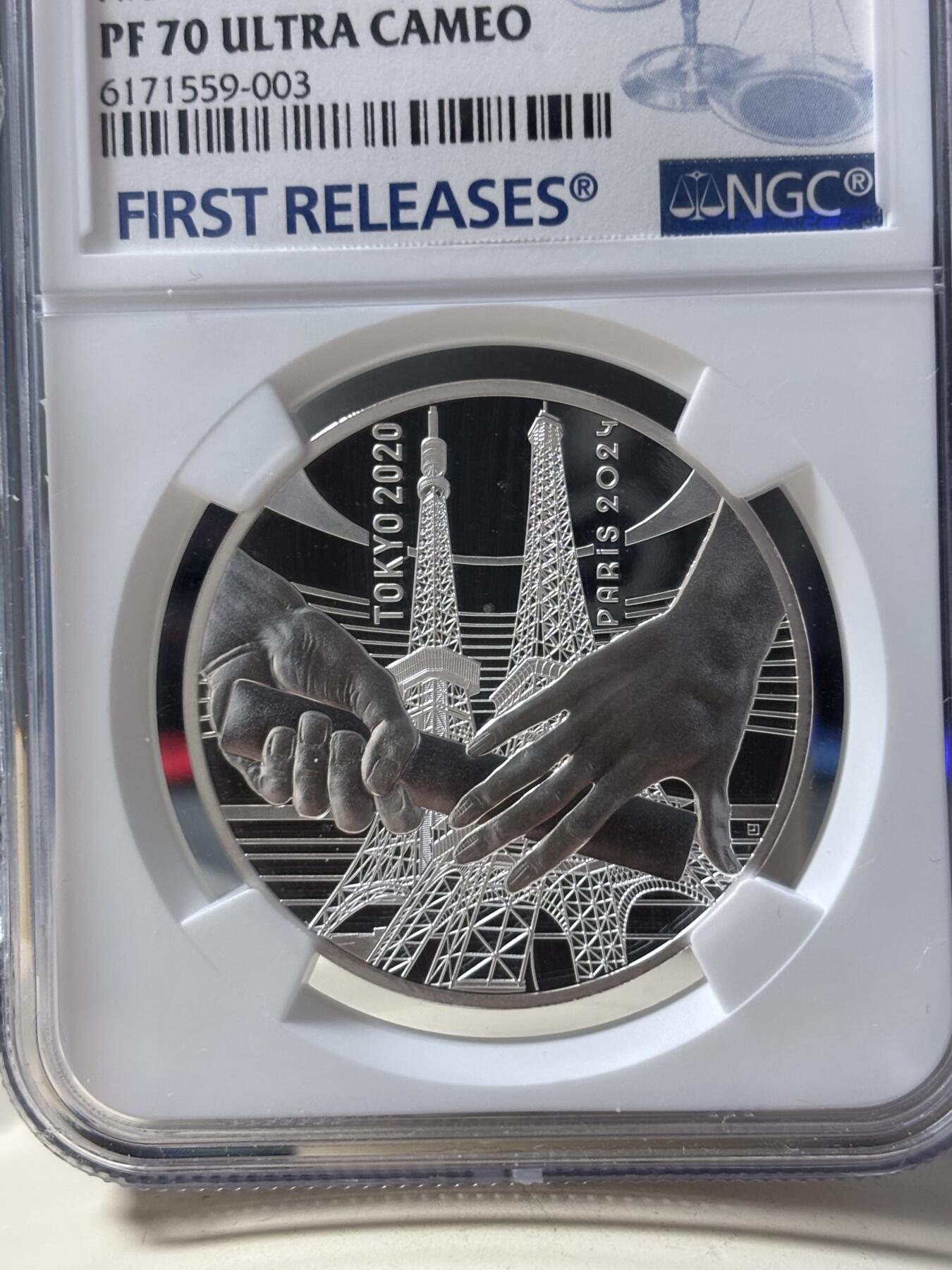 第190期拍卖 法国2021年东京到巴黎奥运交接纪念银币NGC-PF70首，22.2克，999银，发行30000枚，有白点