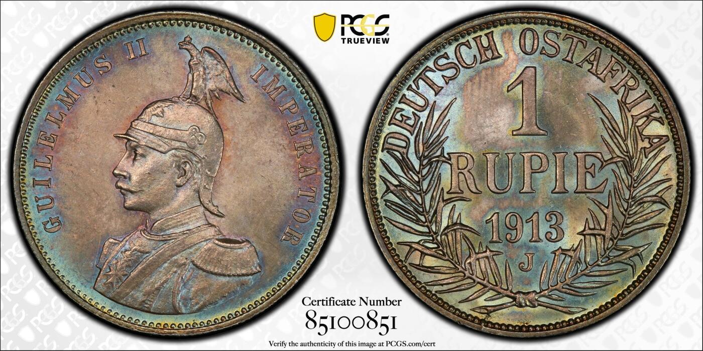 万国钱币拍卖第060期（万国六十期纪念大拍） PCGS MS64 1913德属东非威廉二世戎装1卢比银币 德属热门品种 高分极其难得 丝绸转光底板绚烂孔雀蓝彩环绕  PC唯二冠军