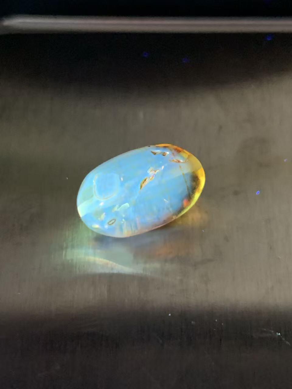 乌克兰花珀通货枣形桶珠一个，