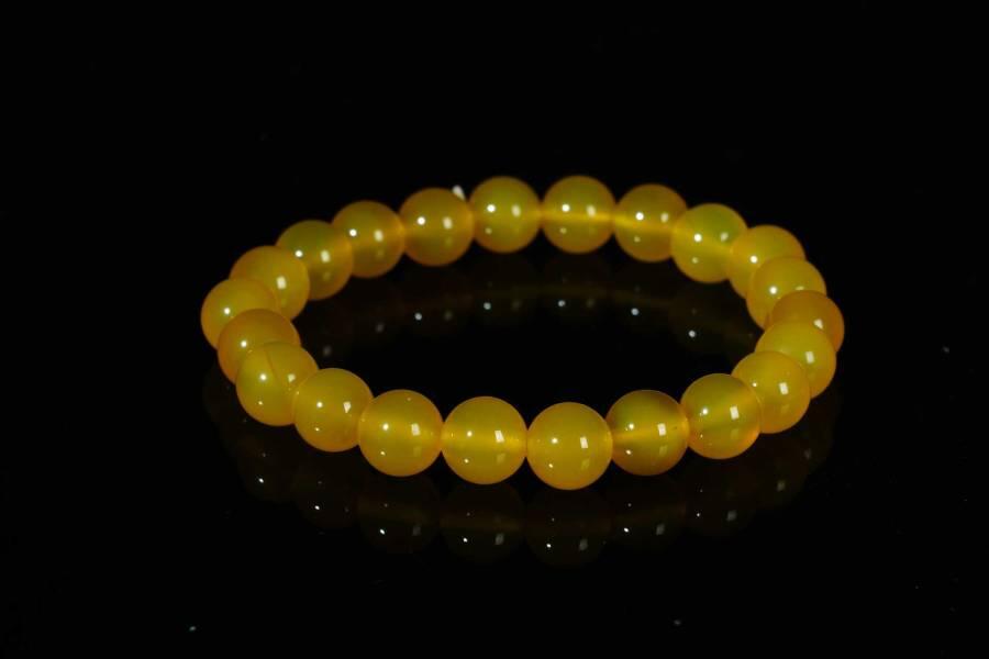 上海都达杂项专场十八（全场包邮） 天然黄玛瑙0.8圆珠手串 附鉴定证书