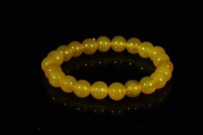 上海都达杂项专场十八（全场包邮） - 天然黄玛瑙0.8圆珠手串 附鉴定证书