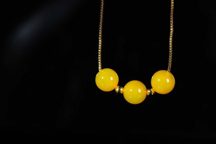 上海都达杂项专场十八（全场包邮） 天然黄玛瑙圆珠三生三世挂件 附鉴定证书