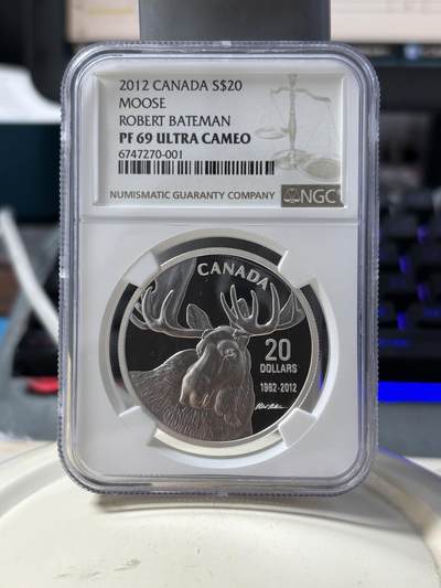 第190期拍卖 - 2012年加拿大驼鹿纪念银币NGC-PF69，  31.105g,999银