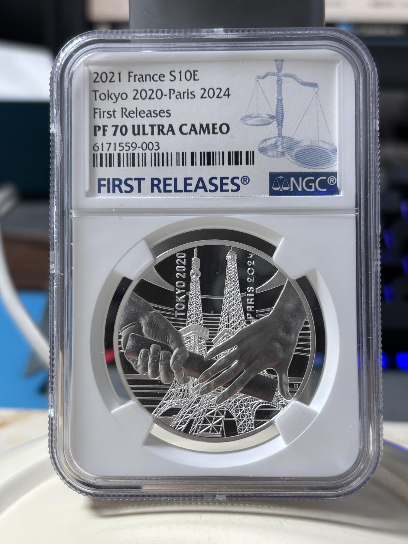 第190期拍卖 法国2021年东京到巴黎奥运交接纪念银币NGC-PF70首，22.2克，999银，发行30000枚，有白点