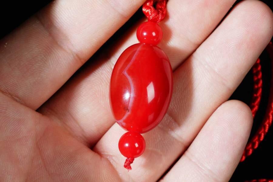 上海都达杂项专场十八（全场包邮） 天然红玛瑙路路通吊坠挂件 附鉴定证书