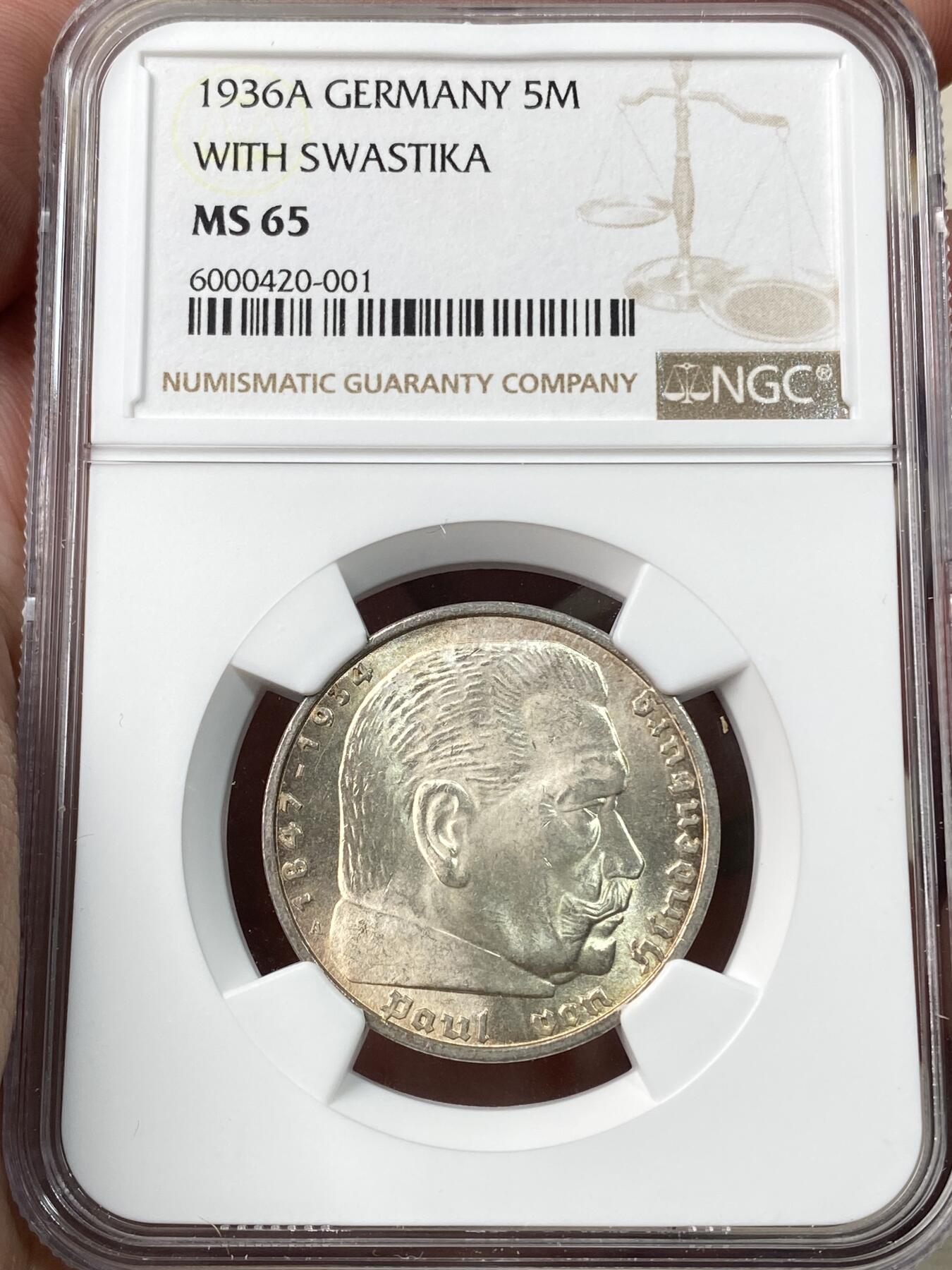 万国钱币拍卖第060期（万国六十期纪念大拍） NGC MS65 1936德国社会主义工人党时期兴登堡5马克银币 香槟金彩丝绸转光 BU相当有难度的品种（原图请私信后台或自行查询官网）