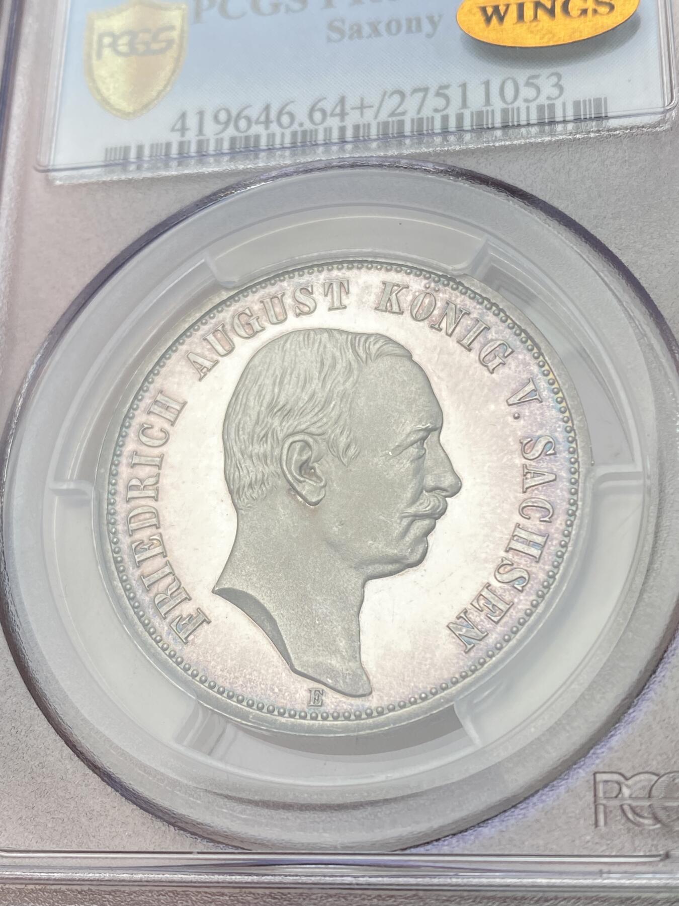 万国钱币拍卖第060期（万国六十期纪念大拍） PCGS PR64+DC 1909萨克森弗雷德里希·奥古斯特精制长翅3马克银币 超级深度镜面 所见最强喷砂 渐变紫罗兰五彩环绕 WINGS金标认证好状态 可遇不可求的顶级典藏品质
