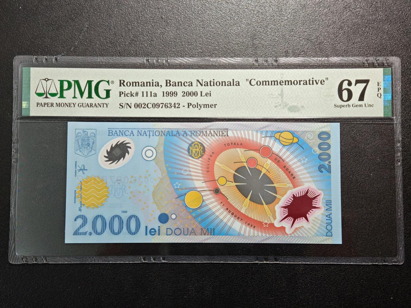 【德藏】世界币章拍卖第164期（拍品征集中~欢迎藏友联系） 1999年 罗马尼亚日全食2000雷塑料纪念钞 PMG 67EPQ