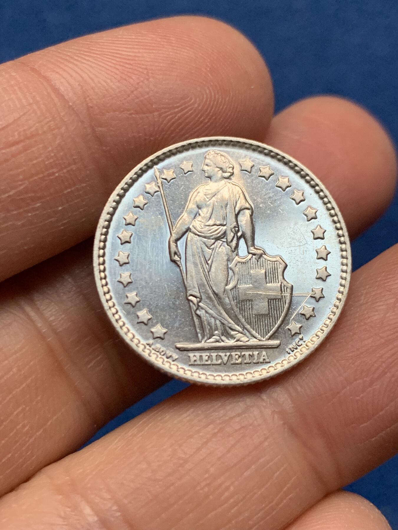 《竞宝斋》第463-465场 周日，周一，周二，3场连拍 （全场包邮）欢迎送拍 1963年瑞士 1法郎银币 有类似精制币的镜面效果 细节见图