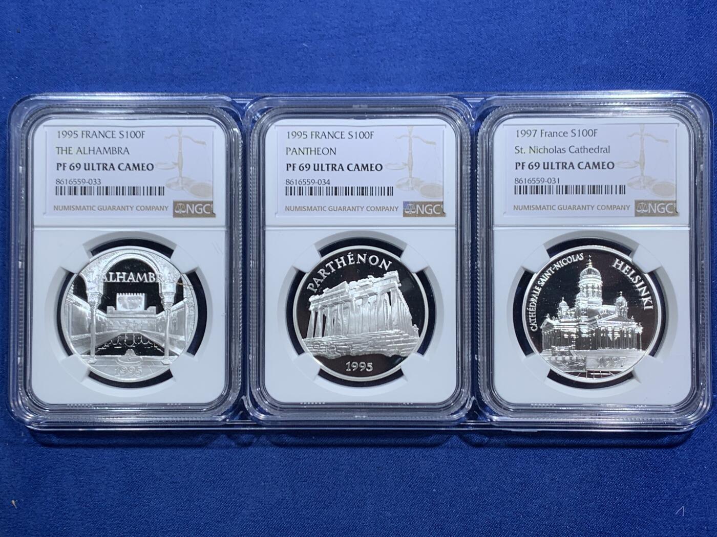 《竞宝斋》第463-465场 周日，周一，周二，3场连拍 （全场包邮）欢迎送拍 三枚一组 NGC PF69UC 法国老币欧洲经典景点系列-瑞典赫尔辛基、希腊帕特农神庙、西班牙阿尔罕布拉宫100法郎精制纪念银币（900银，克重22.2克，镌刻在银币上的永恒记忆，虽然已经历经40年的岁月打磨，但银币依然历久弥新！）