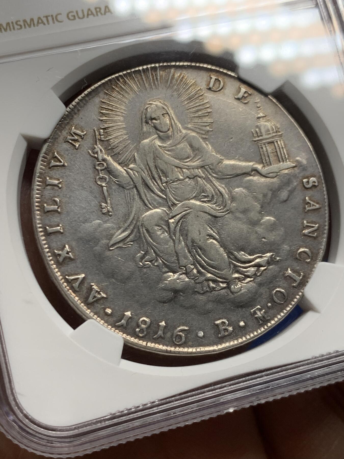 《竞宝斋》第463-465场 周日，周一，周二，3场连拍 （全场包邮）欢迎送拍 NGC XFD 意大利 教皇国 1816年 1斯库多 银币 精美云端圣母题材 细节不错 爱不释手的一枚 少见品种