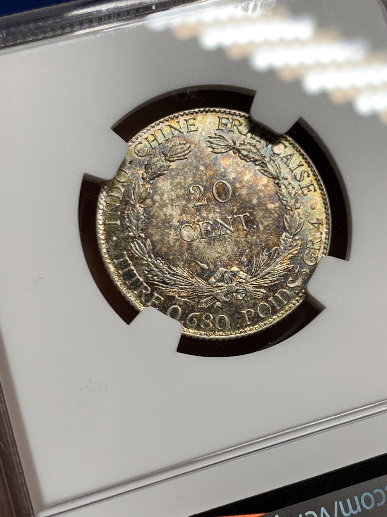 《竞宝斋》第463-465场 周日，周一，周二，3场连拍 （全场包邮）欢迎送拍 NGC MS62 法属印支1937年坐洋20分银币，夺目绚丽五彩，分数虽然一般但彩不错