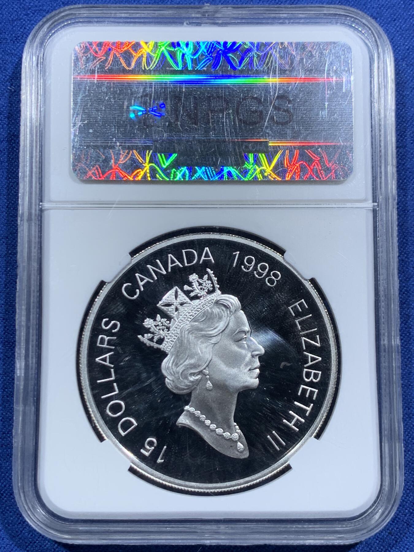 《竞宝斋》第463-465场 周日，周一，周二，3场连拍 （全场包邮）欢迎送拍 NPGS PF70 加拿大1998年生肖虎镀金银币 925银，34克，直径40毫米，发行量68888枚。众诚评级封装。