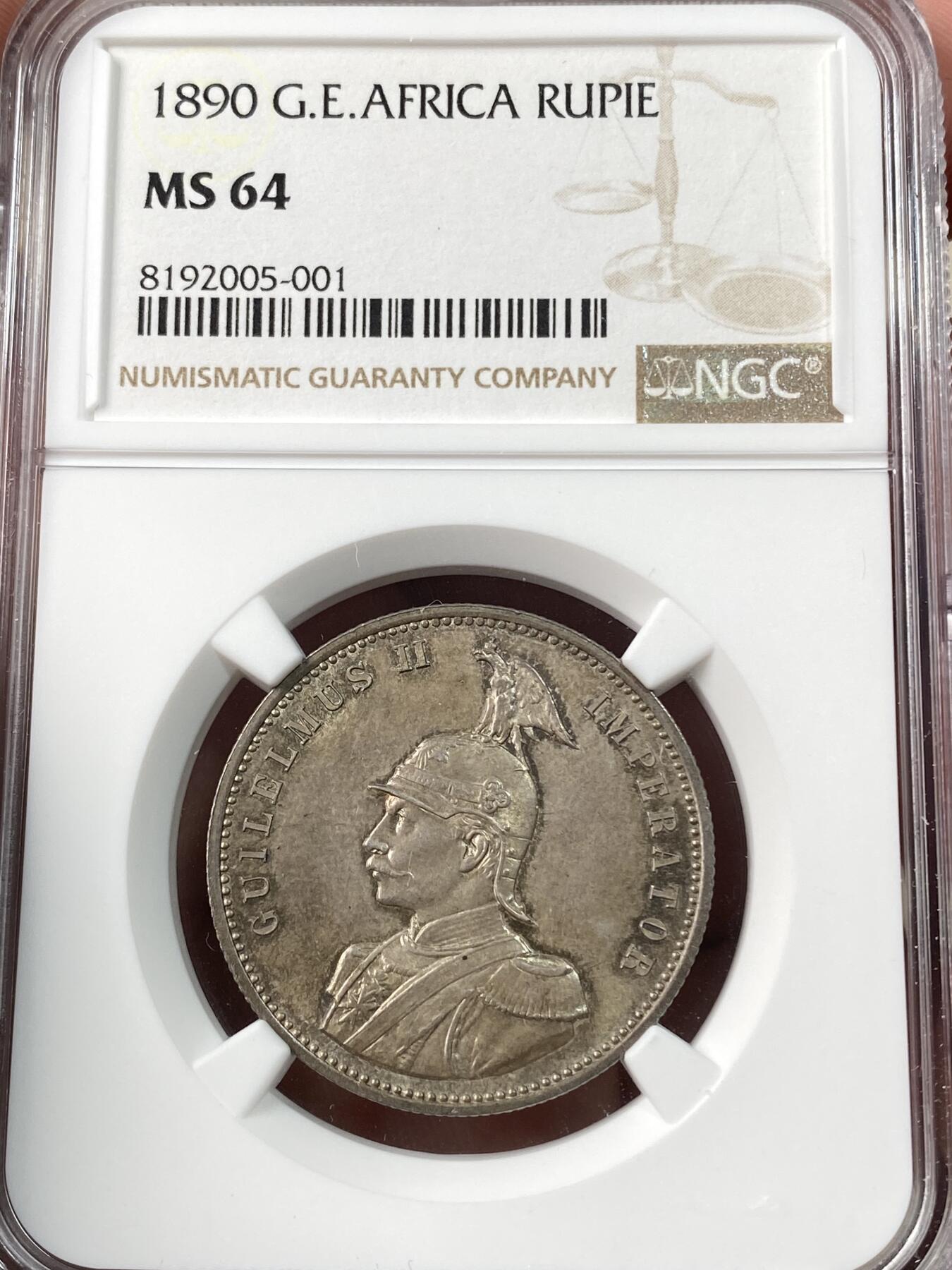万国钱币拍卖第060期（万国六十期纪念大拍） NGC MS64 1890德属东非威廉二世戎装1卢比 德属大热门品种 全深打原味五彩裹身 观感超越分数的典藏级品质