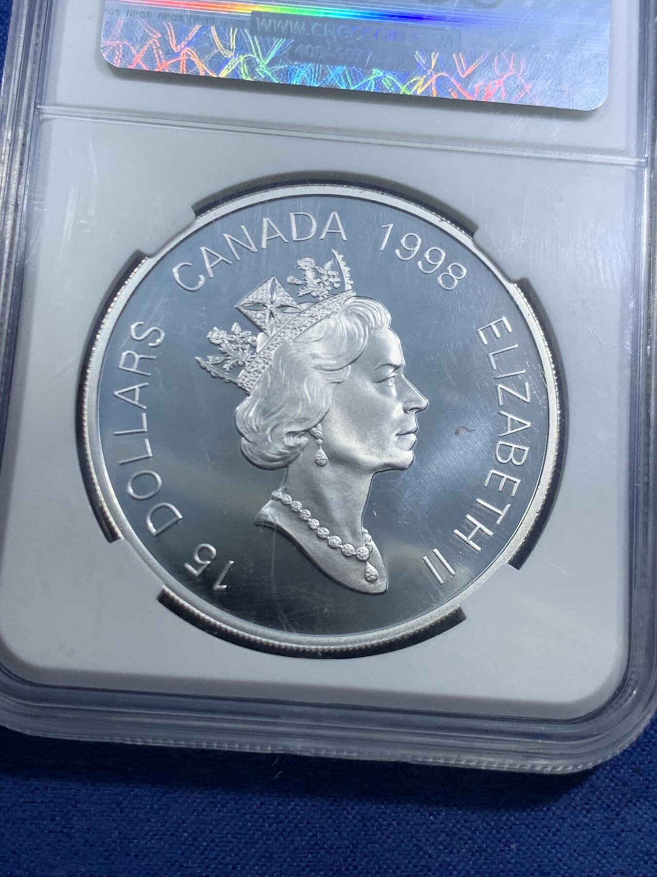 《竞宝斋》第463-465场 周日，周一，周二，3场连拍 （全场包邮）欢迎送拍 NPGS PF70 加拿大1998年生肖虎镀金银币 925银，34克，直径40毫米，发行量68888枚。众诚评级封装。