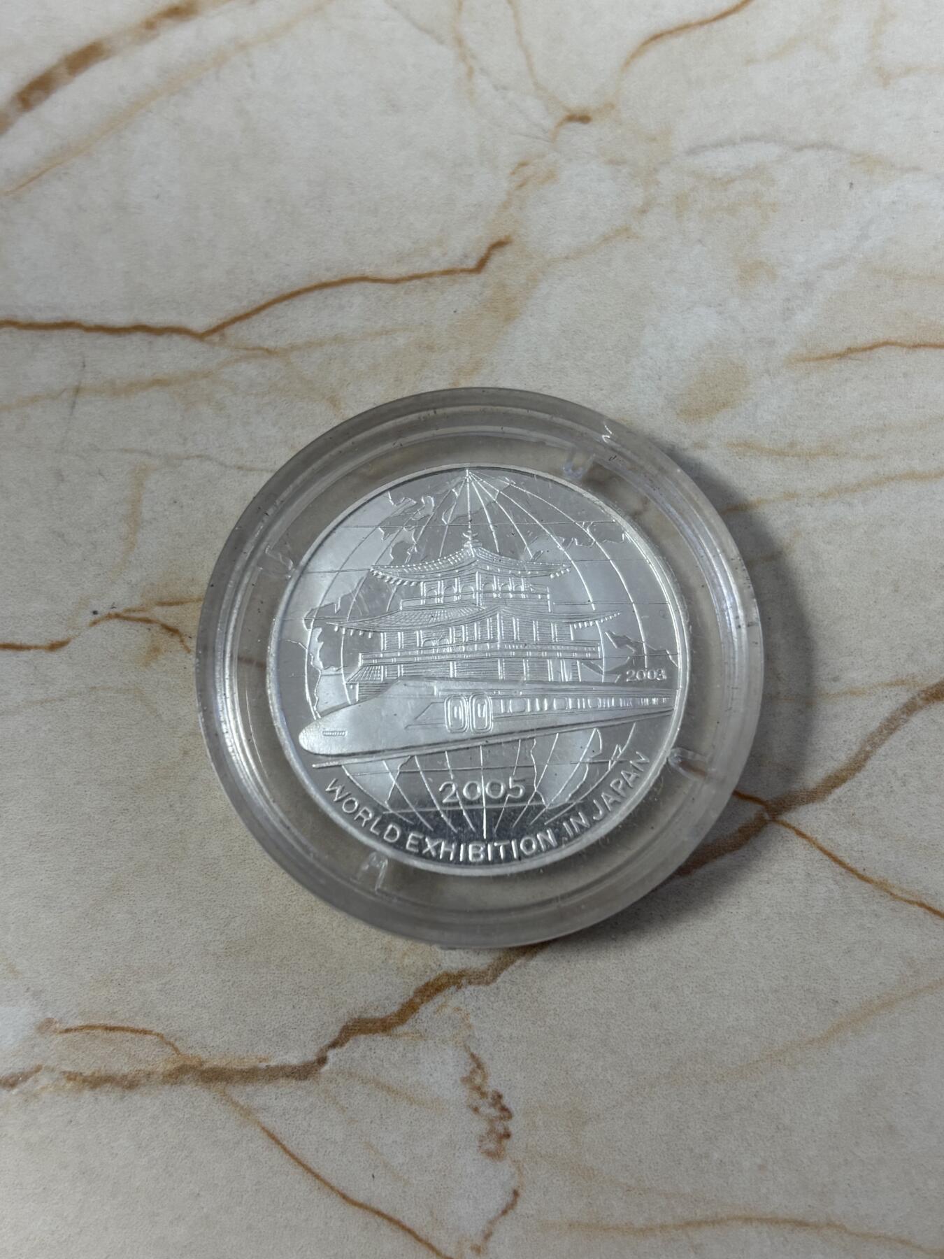 第190期拍卖 朝鲜2005年日本世博会7克纪念银币，999银，